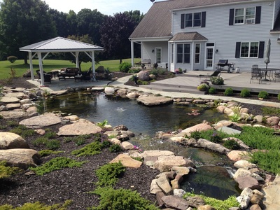Pond repair and reneovation by Acorn Ponds & Waterfalls of Rochester NY