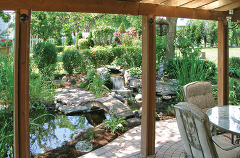 Natural Looking Water Features In Rochester NY By Certified Pond Contractors: Acorn Ponds & Waterfalls. Image