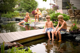 Water Features & Outdoor Living Ideas In Rochester NY By Certified Pond Contractors - Acorn Ponds & Waterfalls. Image