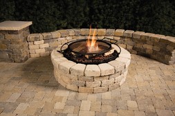 Fire-Pits are great for enhancing your water feature, patio & deck in Rochester NY by Acorn Ponds & Waterfalls. 
