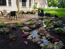 Natural looking streams are great ideas for outdoor patios, decks & koi ponds in Rochester (NY)