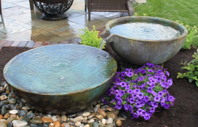 Looking for some water feature or landscape ideas for your new patio or deck in Rochester New York (NY) ?