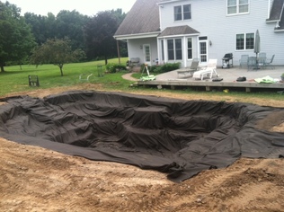 Landscape Fabric Installed Under EPDM Pond Liner In Rochester NY By Acorn Ponds & Waterfalls. Image