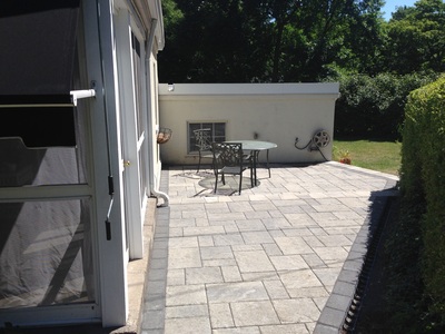 Multi tiered patio design & installation in Rochester New York (NY) by Acorn Ponds & Waterfalls
