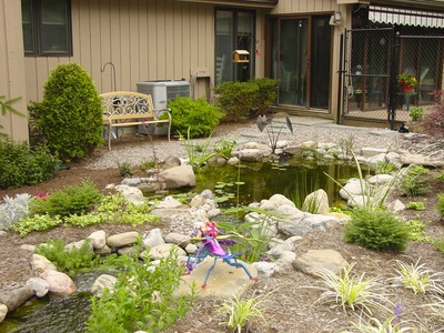Landscape Ponds & Backyard Landscaping Ideas By Acorn Ponds & Waterfalls In Rochester NY Near Me