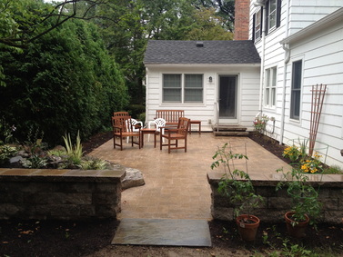 Patio with pillars  in Rochester New York (NY) by Acorn Ponds & Waterfalls
