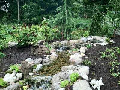 Attract butterflies & birds with our pondless disappearing waterfalls in Western New York (NY)
