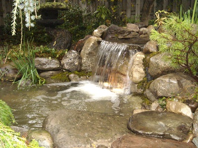 Waterfalls & Backyard Landscaping Ideas By Acorn Ponds & Waterfalls In Rochester NY Near Me