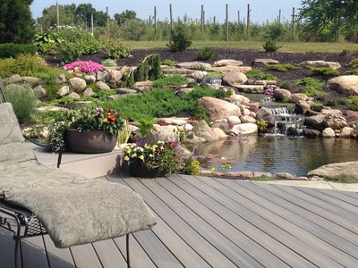 Koi Ponds & Backyard Landscaping Ideas By Acorn Ponds & Waterfalls In Rochester NY Near Me