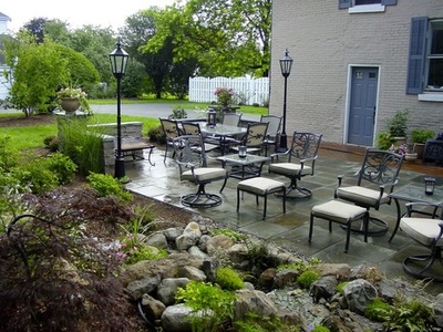 Natural cut slate, formal looking patio design & construction by Acorn Ponds & Waterfalls in NY