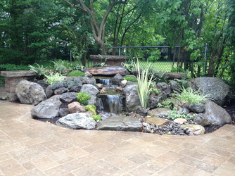 Have your Pondless Waterfalls Installed by a certified pond contractor [Acorn] in Rochester New York (NY)