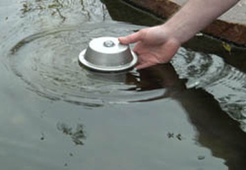Floating heaters, pond de-icers & bubblers for fish ponds in winter - Acorn 585.442.6373