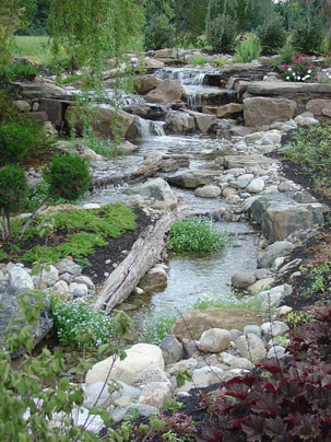 Streams installation service in Rochester New York (NY By Certified Aquascape Contractors - Acorn Ponds & Waterfalls