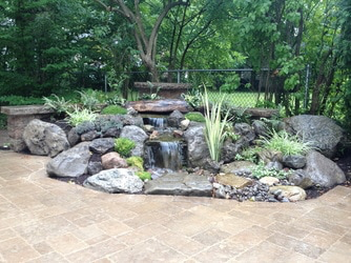 Pondless Waterfall Design & Construction in Rochester NY By Acorn Ponds & Waterfalls