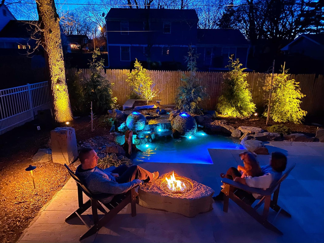 Water feature & koi pond lighting ideas for outdoor living areas in Rochester (NY) by LED Landscape Lighting contractors - Acorn Ponds & Waterfalls