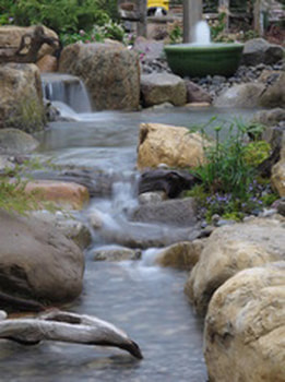 Let us help you design a beautiful stream for your koi fish pond in Rochester New York (NY)